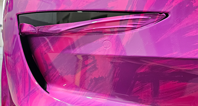 Custom pink Tesla full vinyl wrap by Baboon Studios Melbourne