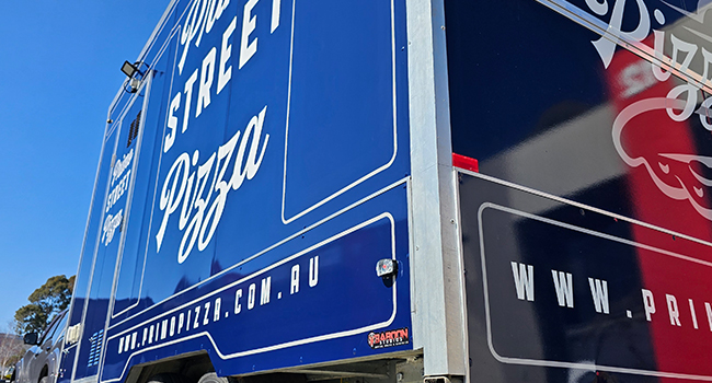 Custom Primo Pizza trailer wrap and business branding by Baboon Studios Melbourne