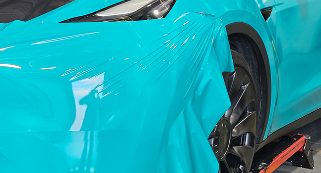 Teal Tesla custom vinyl wrap by Baboon Studios Melbourne