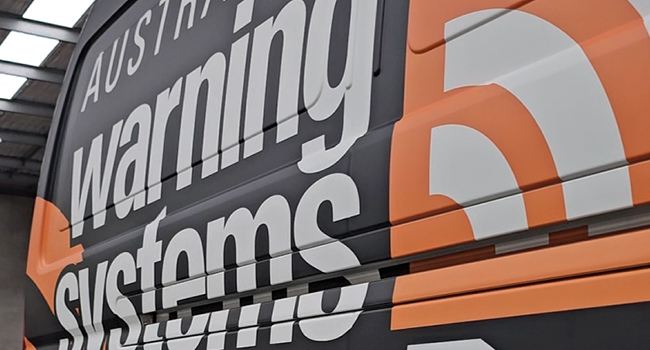 Australian Warning Systems commercial vehicle half wrap and branding by Baboon Studios Melbourne